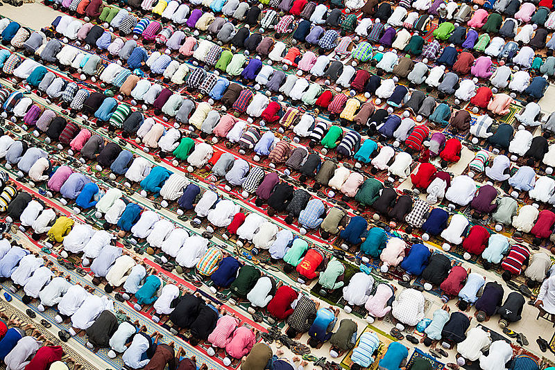 muslims praying in congregation at the mosque in ramadan