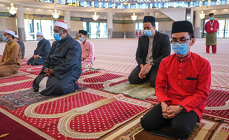 Social distancing muslim congregational prayer inside the National Mosque during the 'movement control order' COVID-19 outbreak.